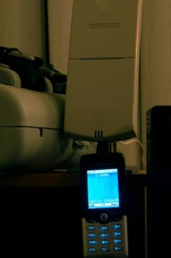 A five-bar cell phone in front of Z1900 repeater.